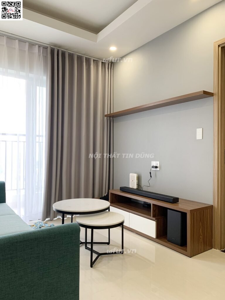 Lavita Charm – Lam gỗ óc chó và sofa xanh ngọc